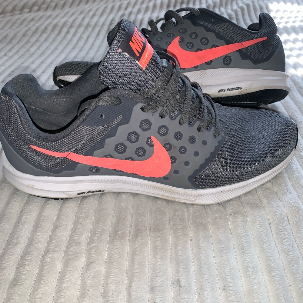Gray and pink Nike size 9 1/2